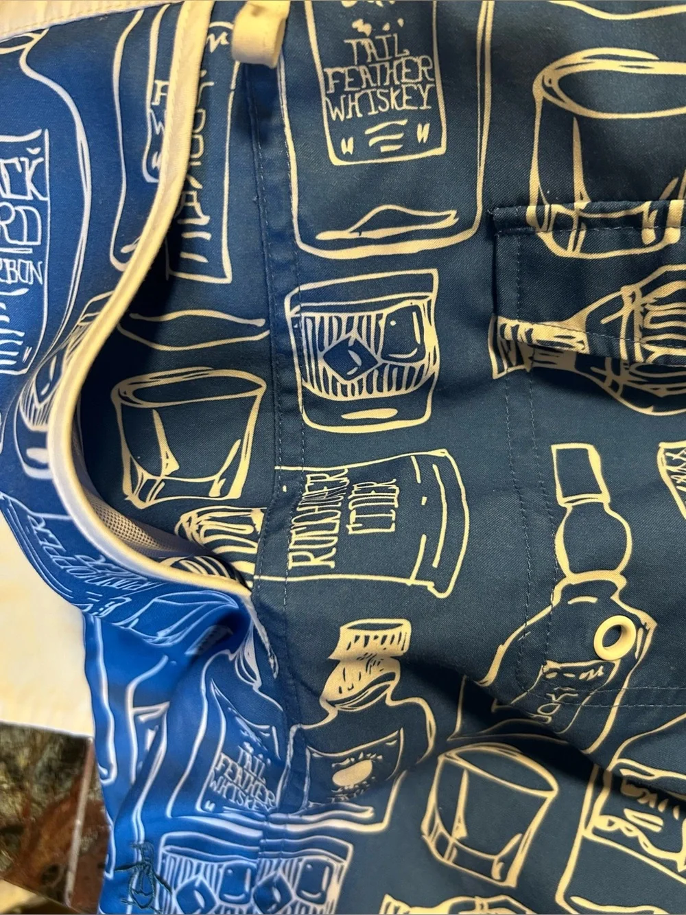 Penguin blue men’s swim trunk alcohol bottles, size 34